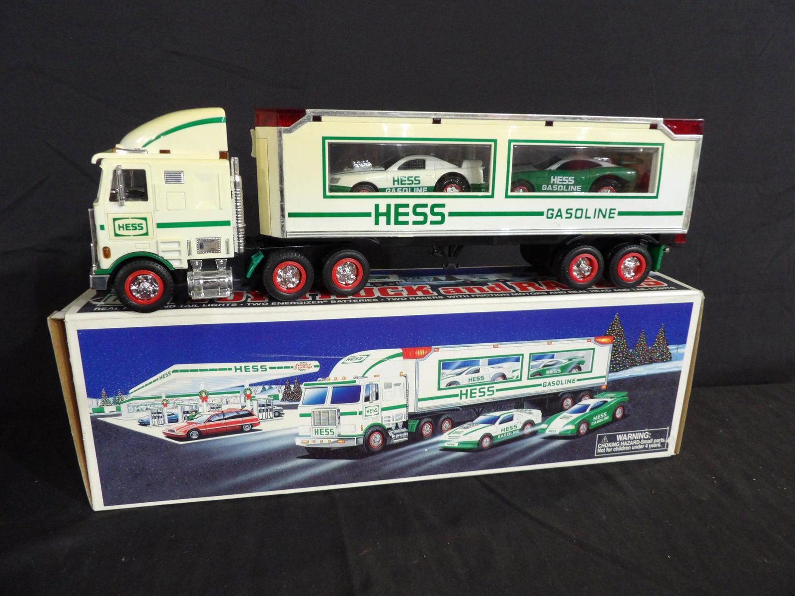 HESS GASOLINE TOY TRUCK W/ LIGHTS AND SOUND AND 2 FRICTION RACERS (1 of 6)
