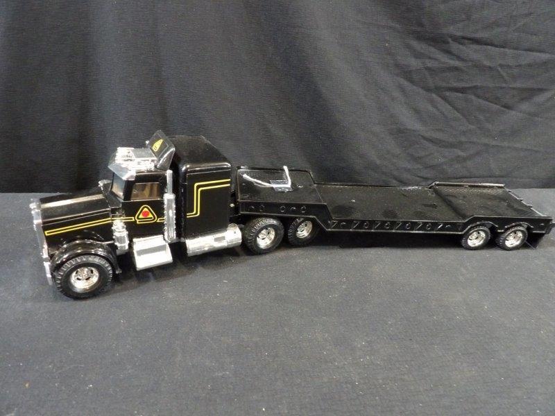 ERTL SEMI W/ LOWBOY TRAILER (1 of 4)