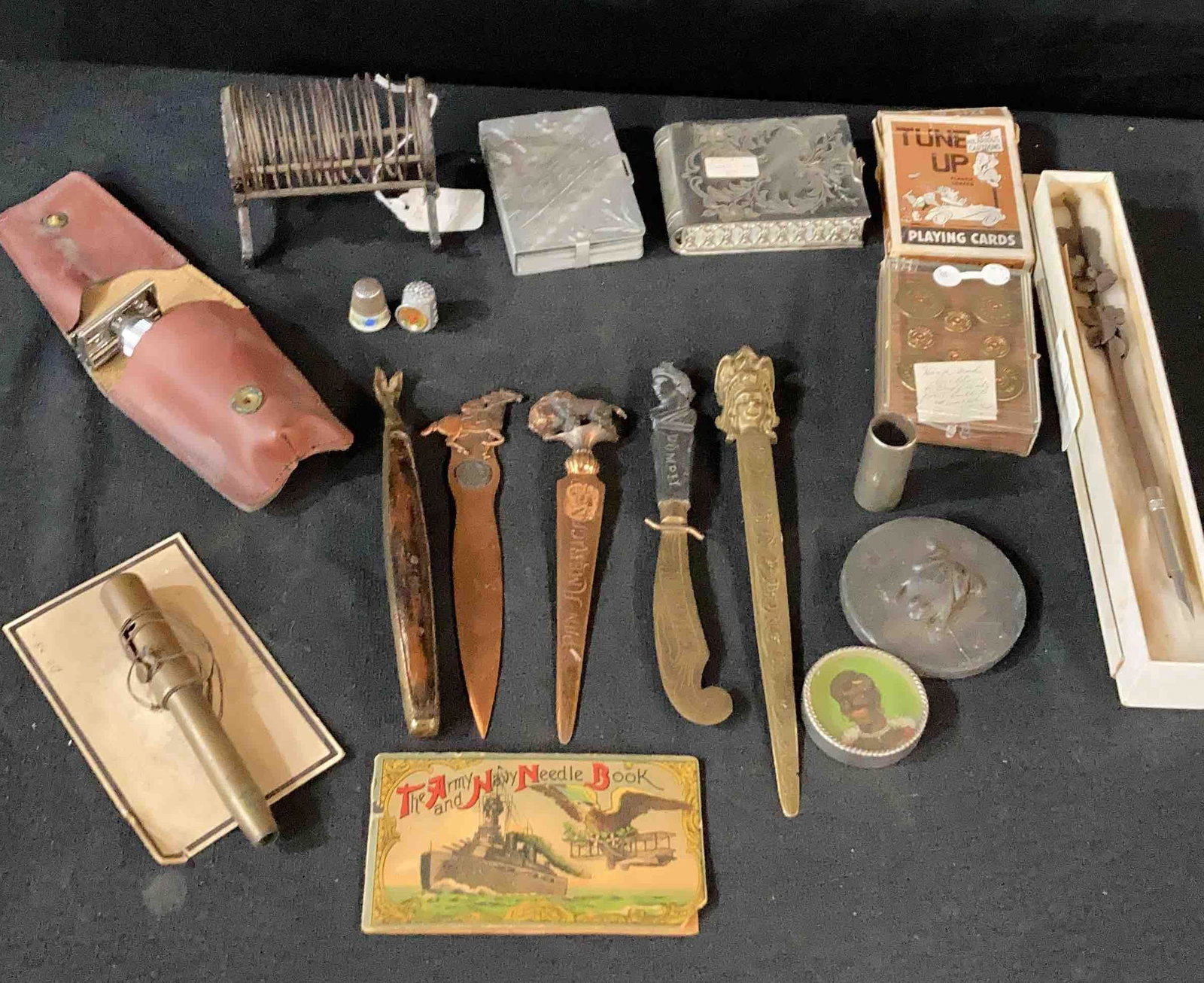 Letter openers, Card Holders, Cufflinks and more: Flat of smalls including calligraphy pen, World fair cards with holder, thimbles, grooming tools, letter openers & other cool items.