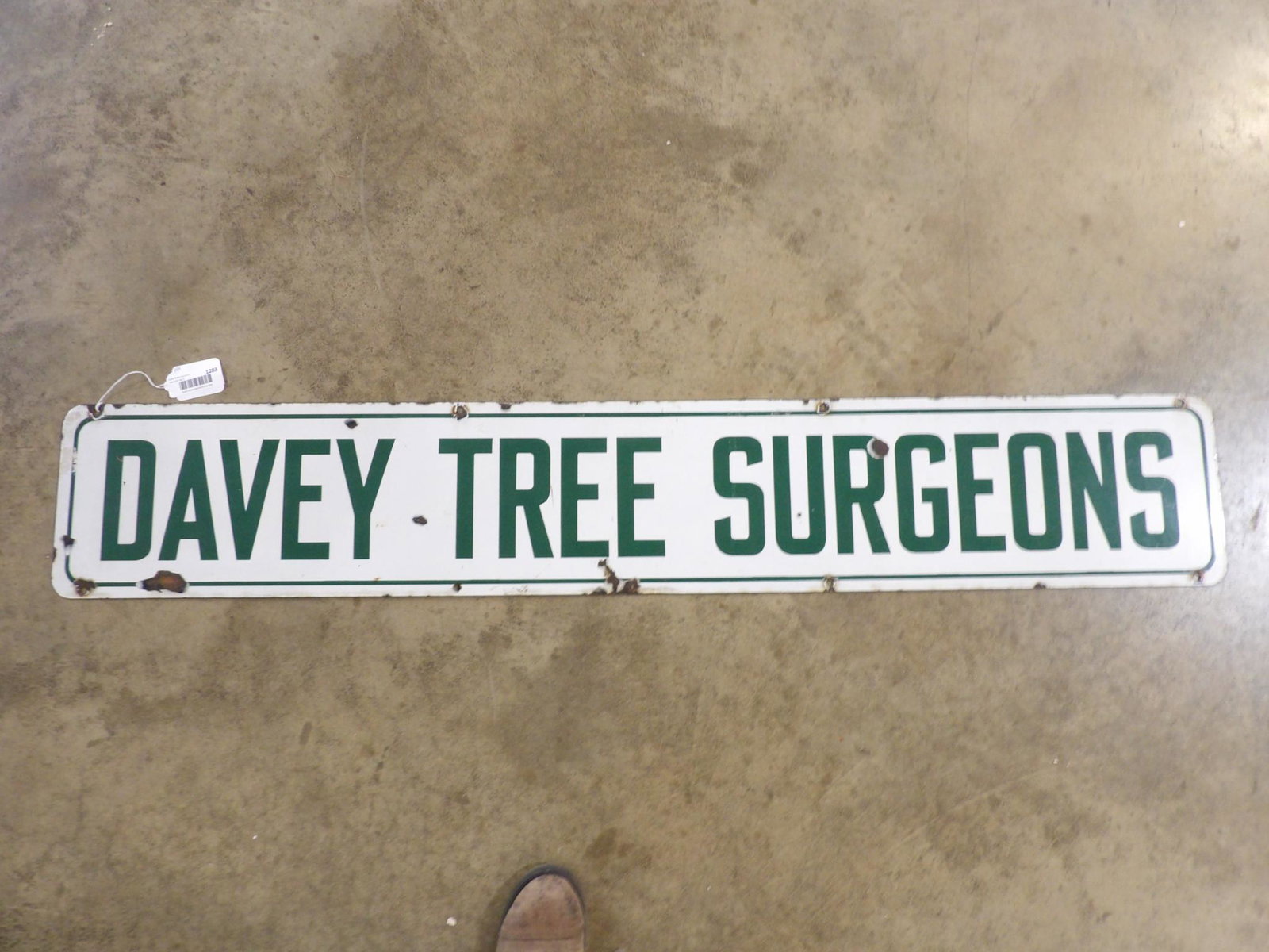SSP Davy Tree Surgeons sign: Single-sided Porcelain sign with a few hits but overall is in good condition, is from Kent State Ohio and is one of three known to exist. 9 in x 54 in.