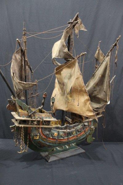 Impressive Wooden Lapinta Ship: This ship is very detailed, with cannons, metal anchors, painted dragons and mermaids netting and more. It is in need of restoration with some wood pieces detached, holes in sails and broken string. 4