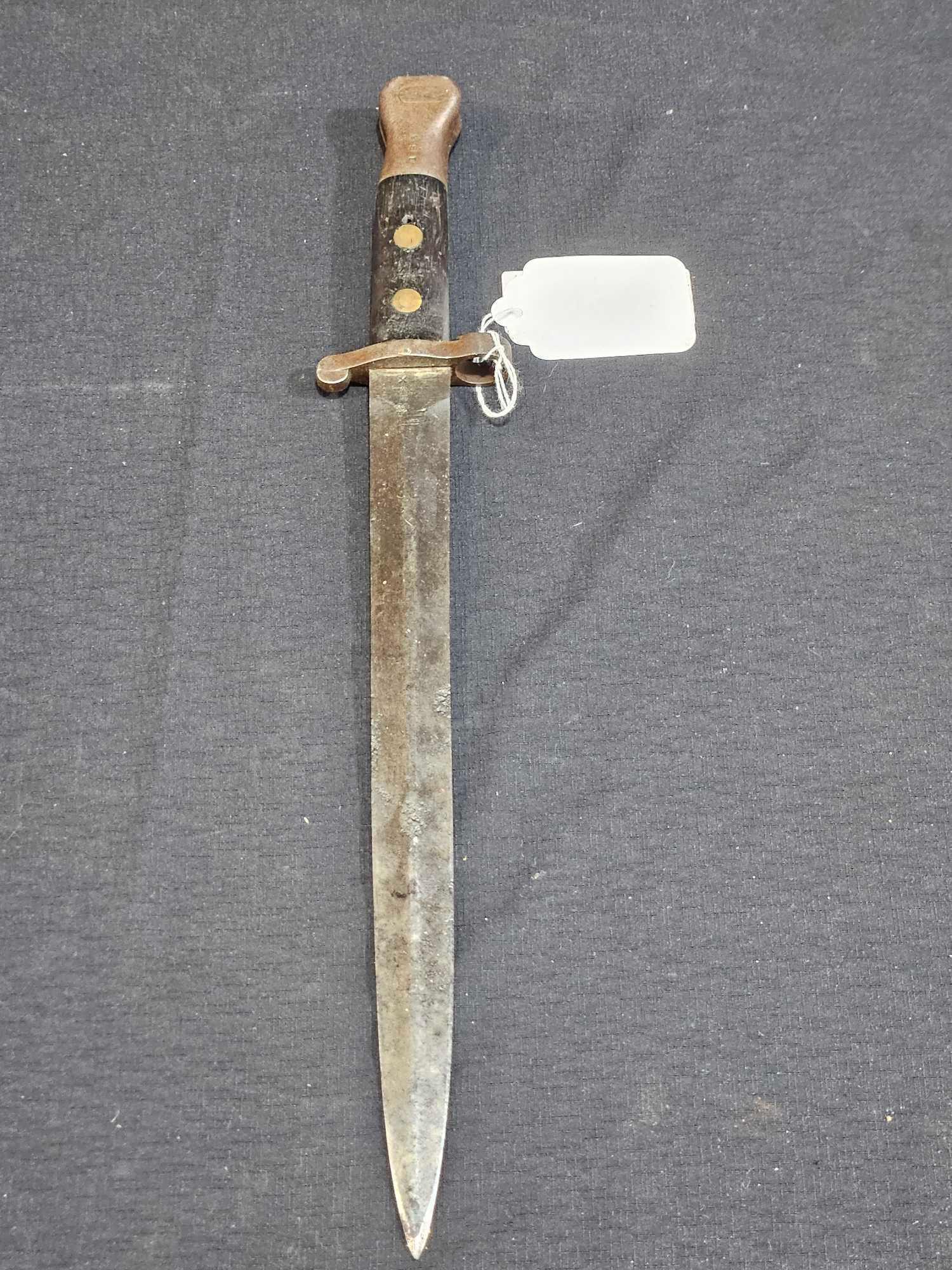 British Sanderson Sheffield Bayonet: Some discoloration on the blade and handle. 12x39;x39; long blade with a total length of 16 1/2x34;.
