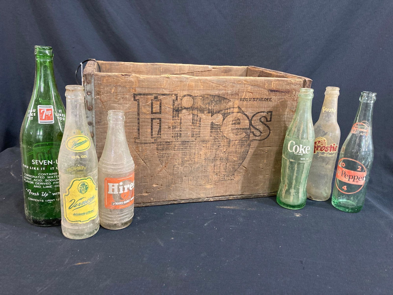 Hires Rootbeer crate w/ various bottles: Includes several early bottles such as Hires, Vernorx39;s, Frostie, Dr. Pepper, 7up & Coke.