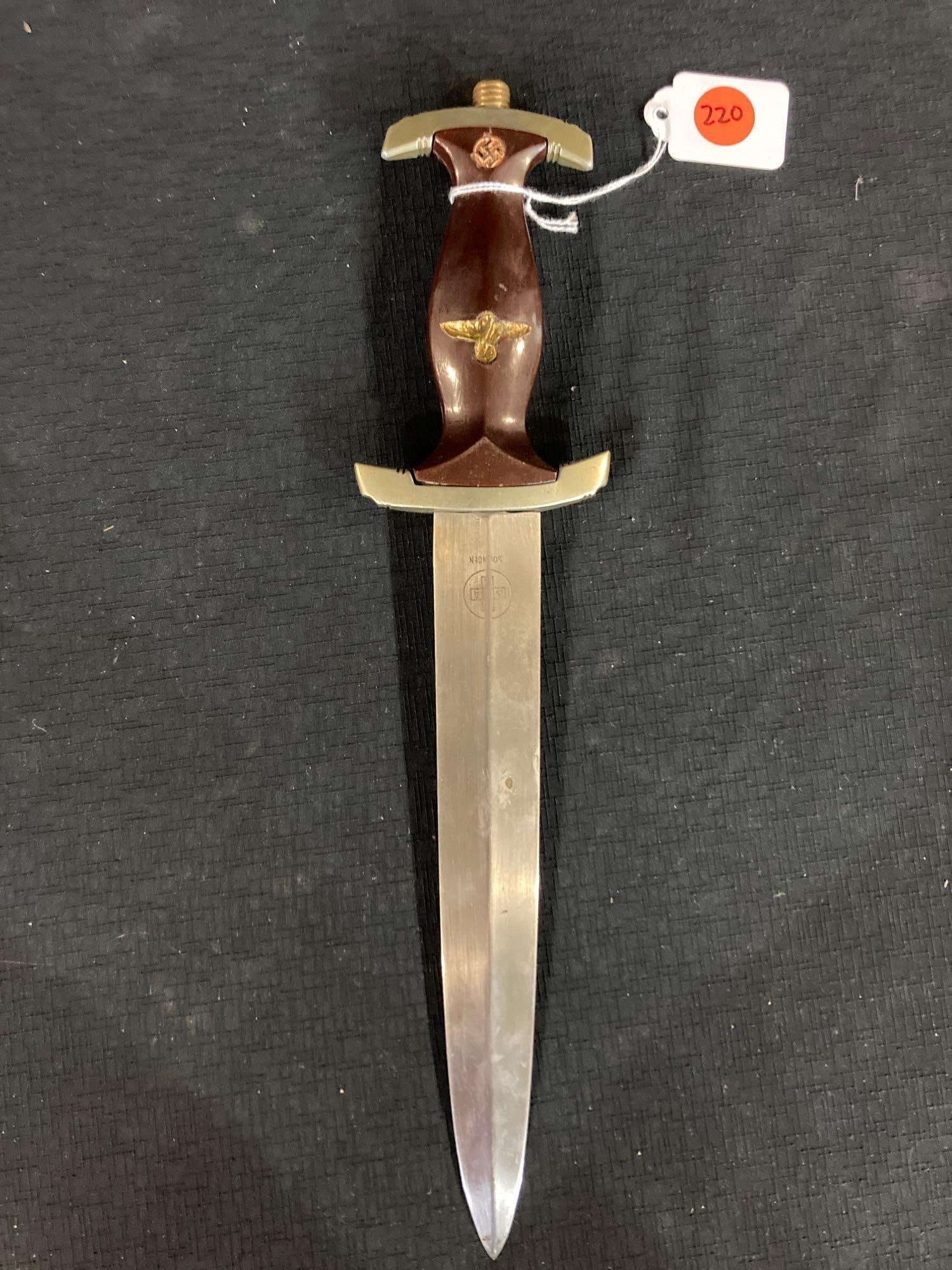 Nazi German Dagger: Solingen, 8 1/2 inch blade. Etching on back side of blade is somewhat faint and hard to read .