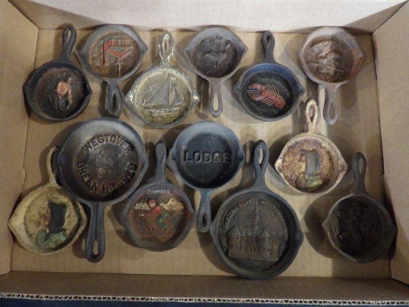 Cast Iron Miniature Skillets/ Ash Trays: Including Skimoblie, California 49ers, Lodge, Westover Green Houses, and many embossed picture skillets. 13 total. Some may have minor surface rusting.