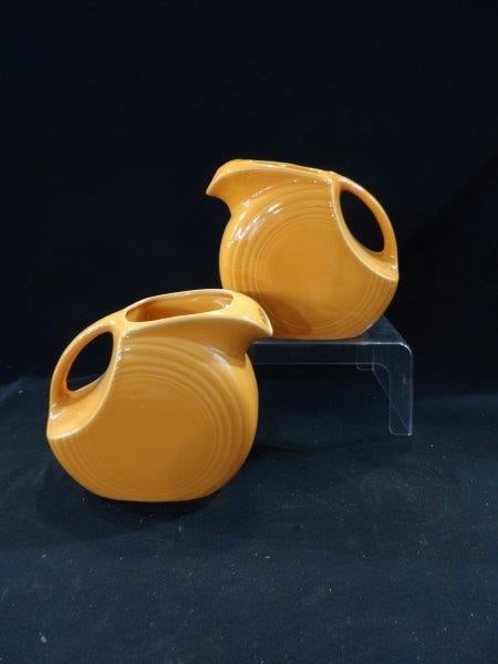 FIESTA WARE RETIRED TANGERINE PITCHERS: 2 PITCHERS, NO CHIPS OR CRACKS
