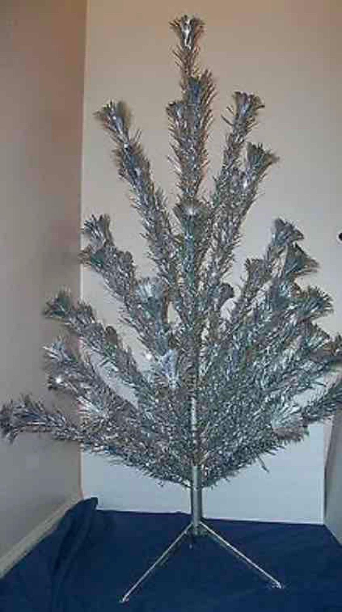 4 FT. POM POM ALUMINUM ROYAL PINE TREE: NEW OLD STOCK IN ORIGINAL BOX WITH INSTRUCTIONS. STOCK PHOTO FOR REFERENCE