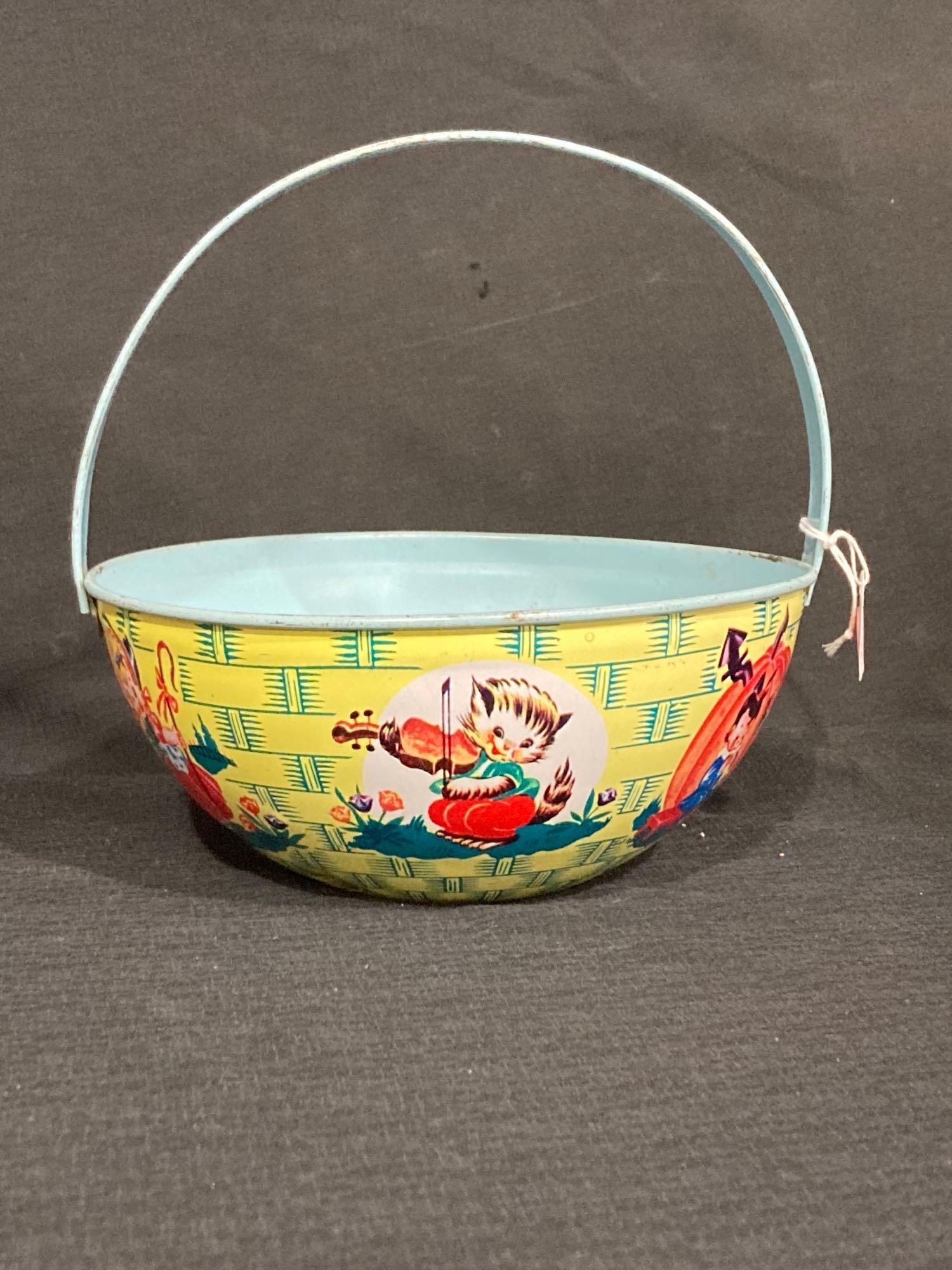J. CHEIN TIN BASKET: J CHEIN, EXCELLENT CONDITION. 3 IN X 7.5IN BASKET.