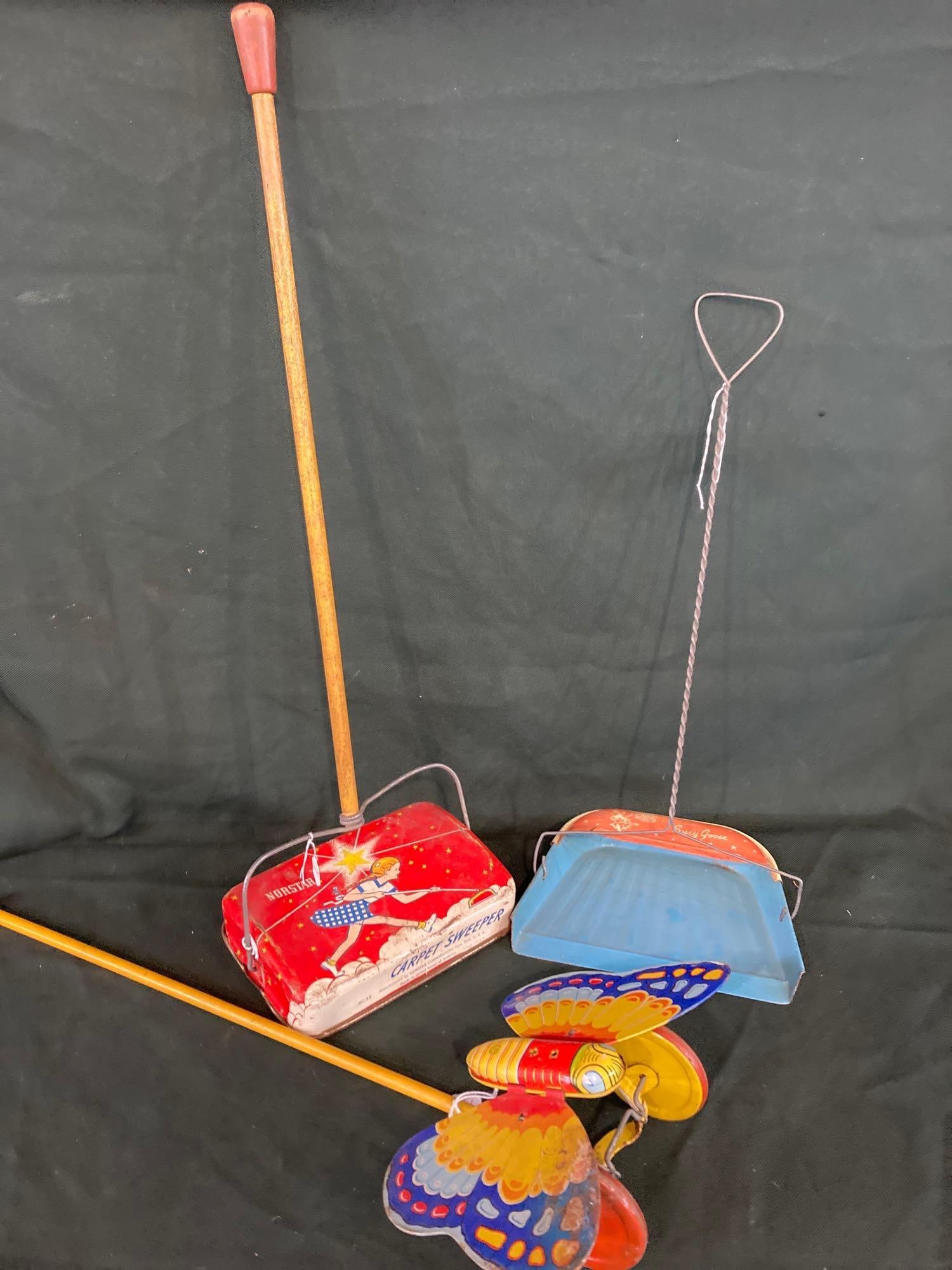 TIN LITHO SWEEPER, BUTTERFLY, & DUSTPAN: CHILDRENS TIN TOYS. EACH APPROX 24 INCHES TALL.