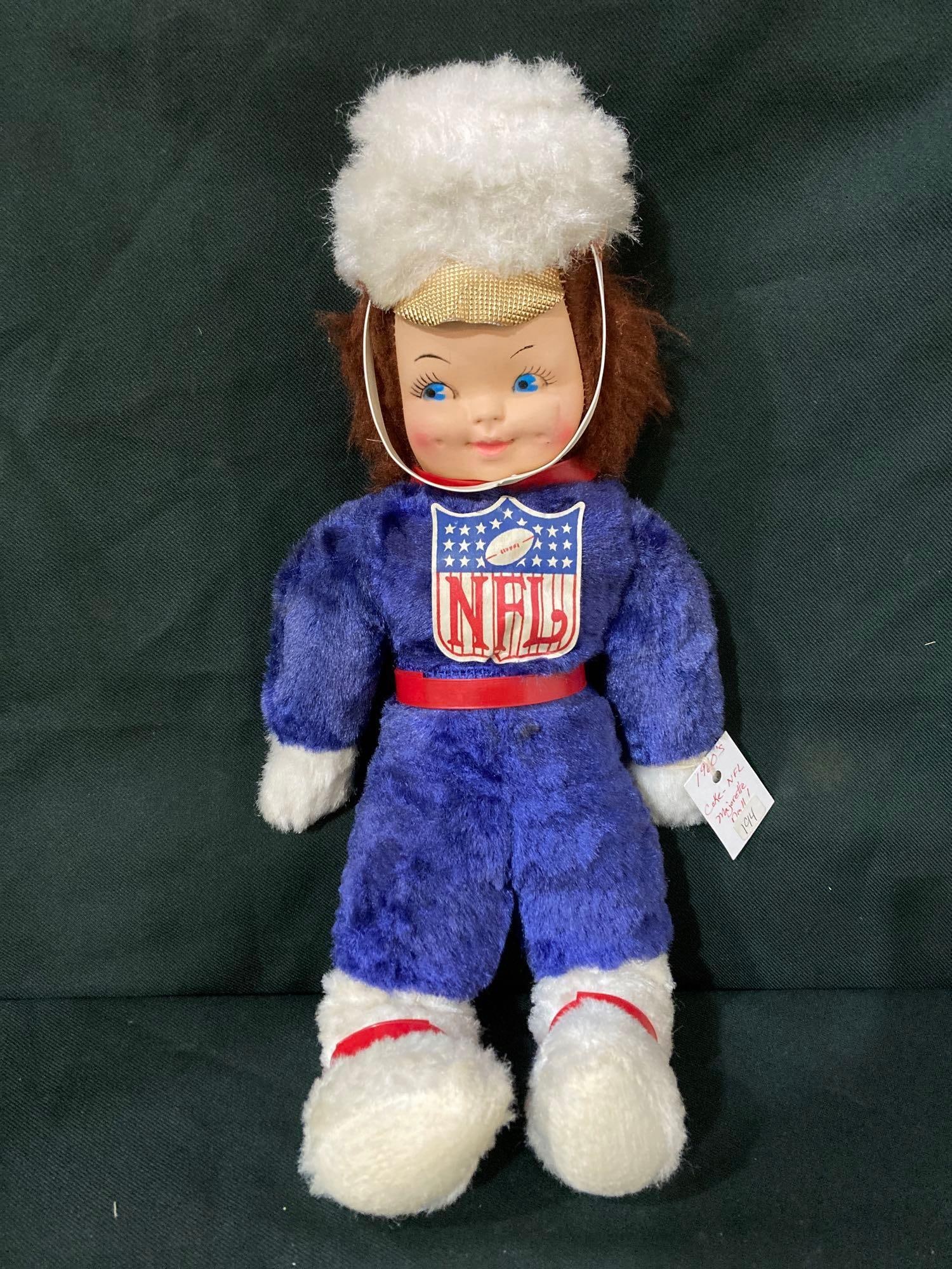 COKE NFL MAJORETTE DOLL: OFFICIAL NFL LOGO. RUBBER FACE 19 INCHTALL