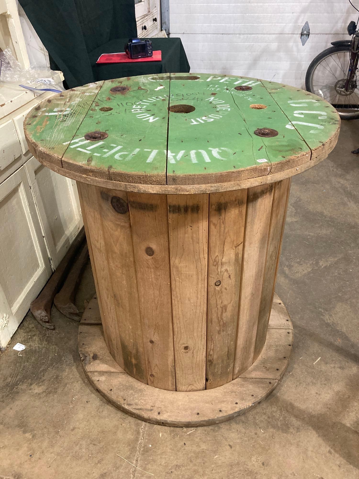 LARGE WOODEN SPOOL: 33 INCHES TALL X 31.5 INCH DIAMETER