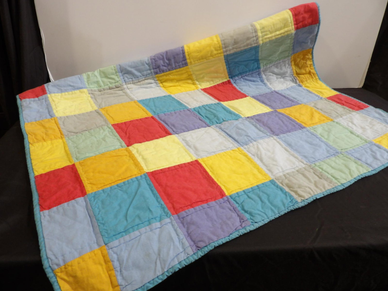 PATCHWORK QUILT: 36X51, 1 SMALL TORN SPOT
