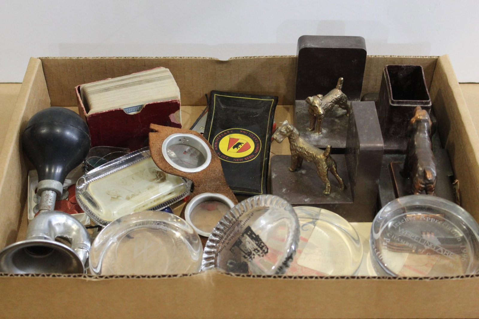 DESK ITEMS, PEPER WEIGHTS & EARLY GLASSES: BIKE HORN. TOKENS AND MANY GLASS PAPER WEIGHTS.