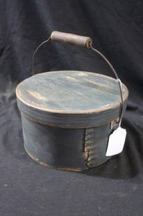 Primitive blue pantry box w/bale handle: 9 1/2X34; diameter 5 3/4X34; tall.
