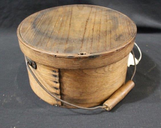 Pantry box with bale handle : 9 1/2 IN; diameter 5 1/4 IN; tall.