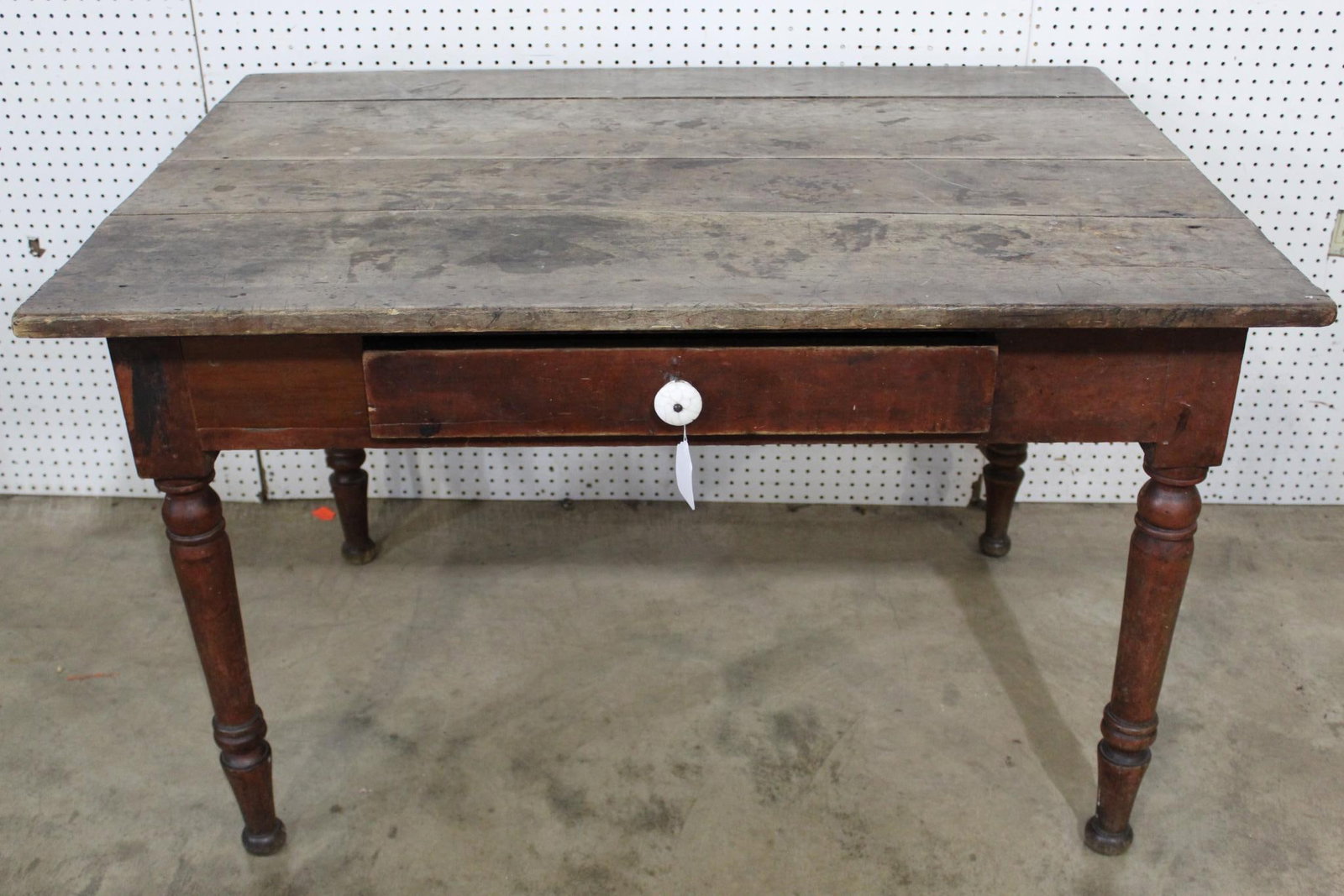 Primitive 1-drw farm table: Top is 34 IN; x 48 IN; and 30 IN; tall.