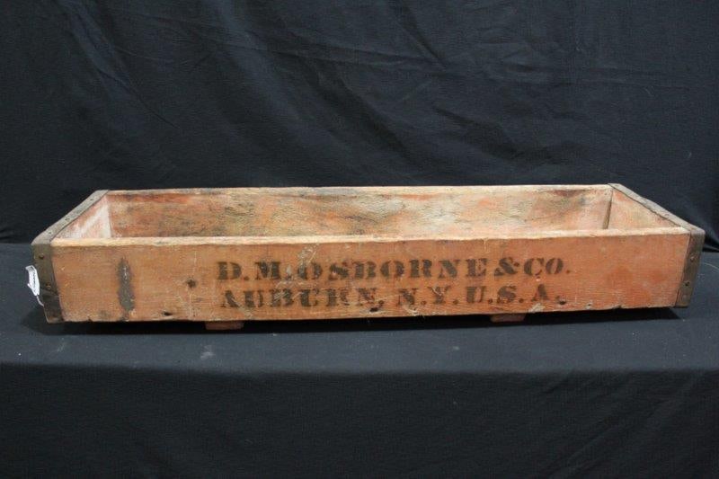 D.M. Osborne & Co. salmon painted box: With great stenciled graphics on both sides and awesome salmon paint!! 35 IN; long 10 IN; wide 4 1/2 IN; high.