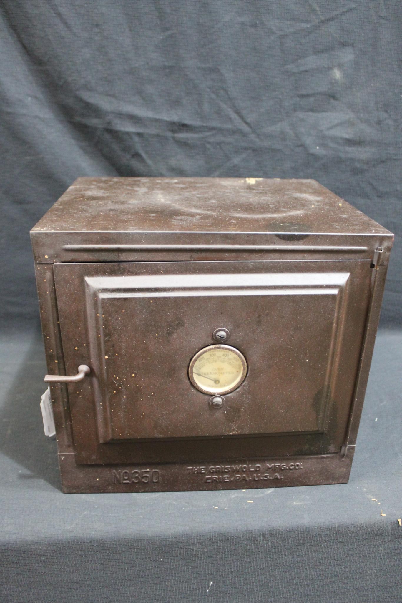 Griswold No. 350 Stove-top baker oven: Shows some corrosion spotting but overall is in good solid condition! 12 IN; wide 10 IN; deep 11 IN; tall.