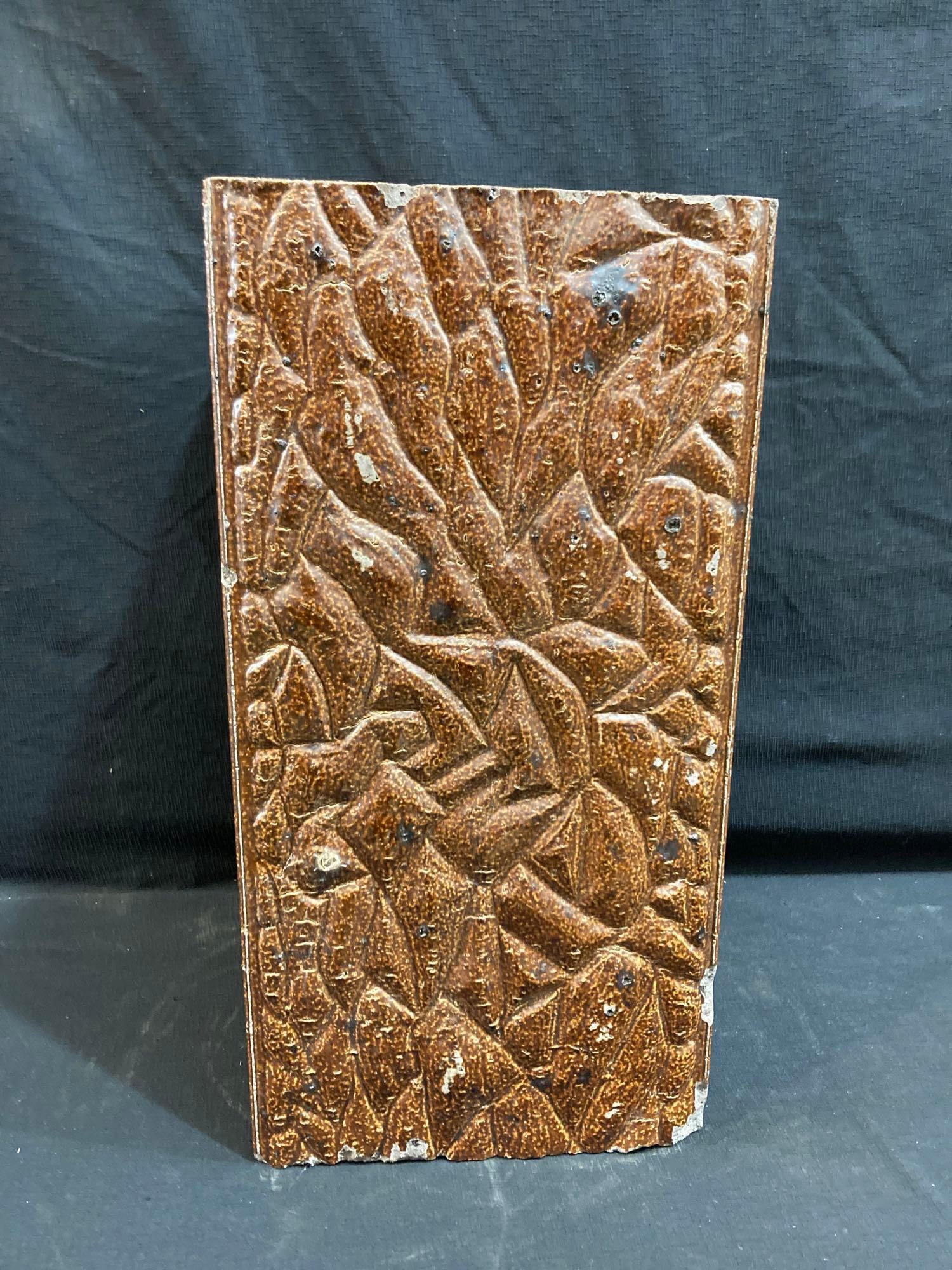 Decorated Sewer Tile: 4 sided open center, No bottom. 8 inch square X 18 inches tall. Three sides are smooth and one side decorative. A few smaller chips on corners and edges but no major cracks