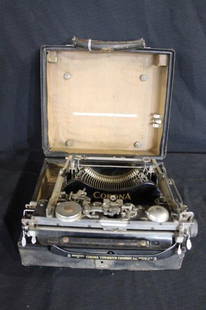 Corona folding typewriter in original case: Good clean condition but was not tested.