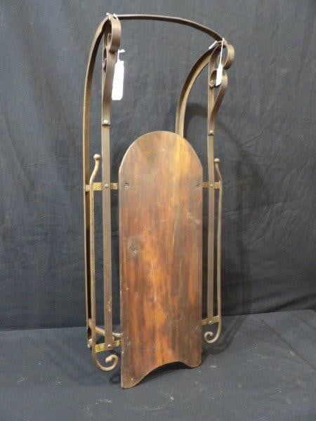 Early ornate wrought iron sled: Circa 1900. 32 IN; long.
