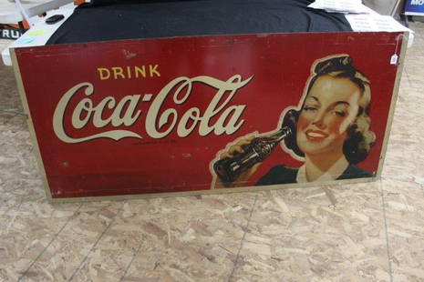 Coca Cola Masonite Advertising Sign: Nice vibrant color and graphics. Shows some scratches and scuffs. AM-9-4 . 67.5 x 30.5. Does have a few holes for hanging