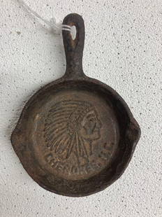 Cherokee NC Miniature Cast Iron Skillet: Minor surface issues. 3 inch diameter with Indian Chief embossed.