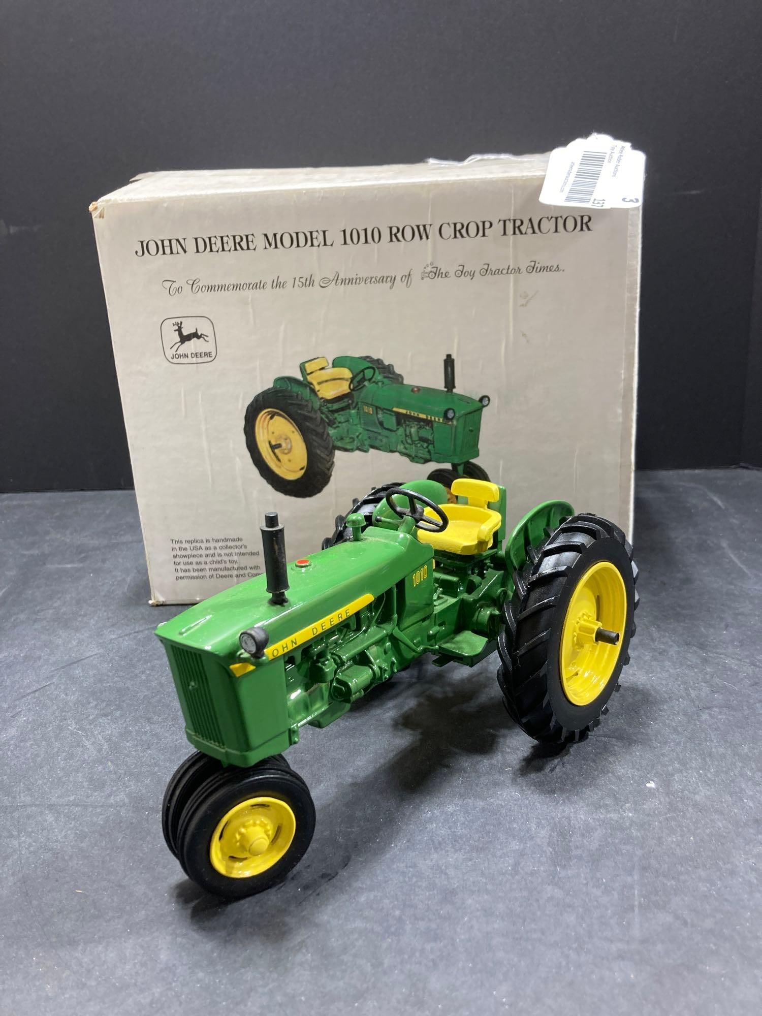 TOY TRACTOR LINES JOHN DEERE MODEL 1010 ROW CROP TRACTOR: 15TH ANNIVERSARY OF THE TOY TRACTOR LINES ?NIB ?1/16 SCALE. HEADLIGHT IS BROKE OFF, BUT IS IN THE BOX