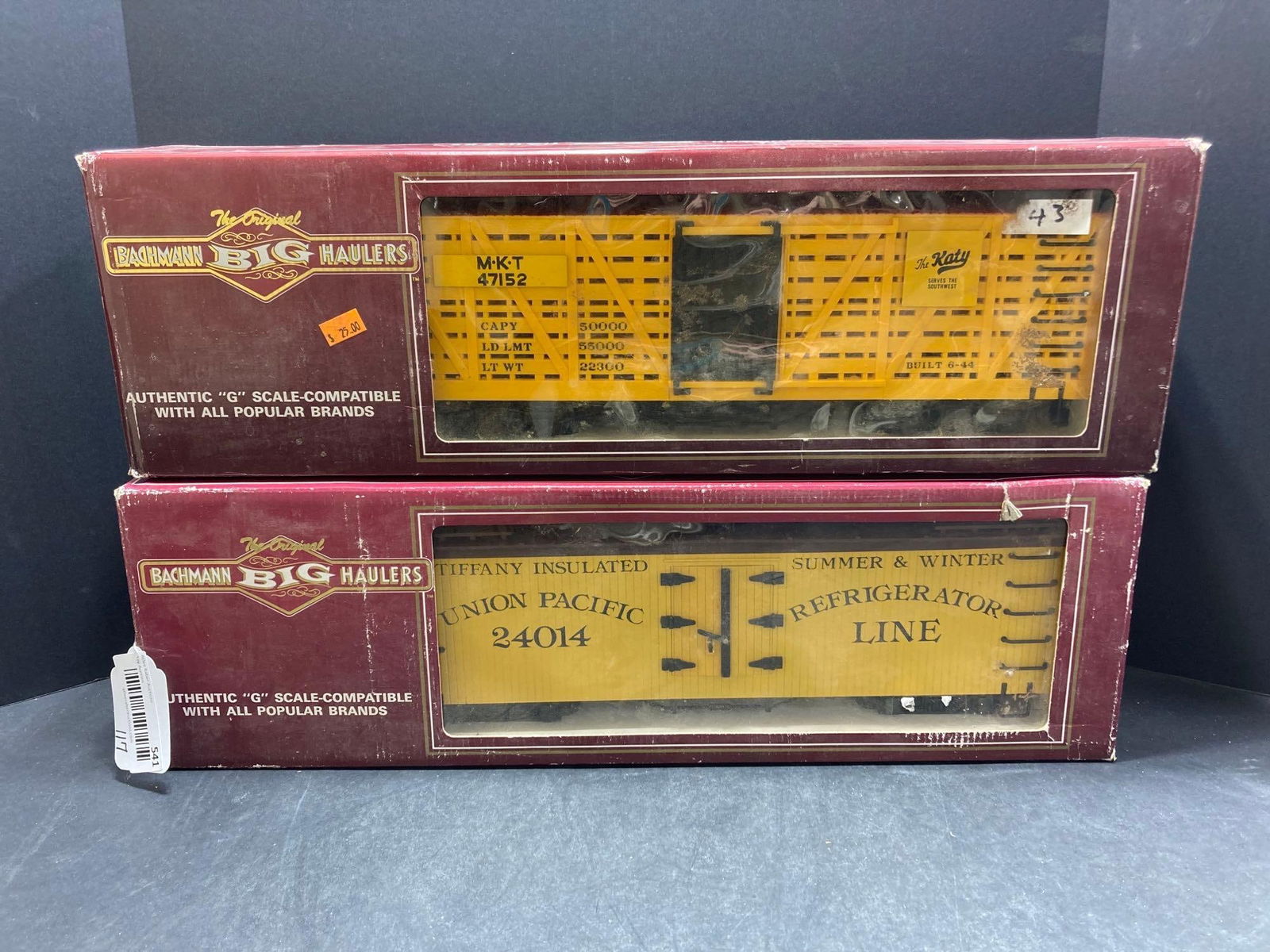 BACHMANN BIG HAULERS G SCALE RAIL CARS LOT OF 2: NIB SHOWING CONDITION ISSUES TO PACKAGING ONLY DUE TO AGE AND DISPLAY ?INCLUDED IN LOT UP DSPP REEFER UNIT NO 93225MISSOURI KANSAS AND TEXAS STOCK CAR NO 98117