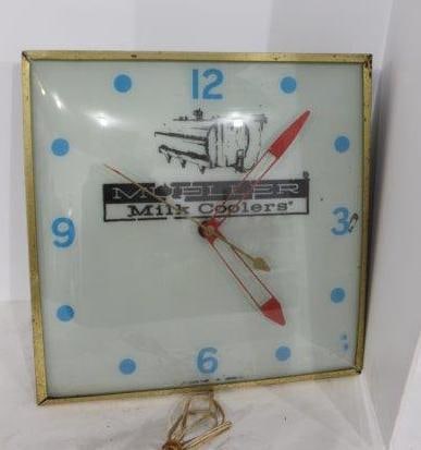 Mueller Milk Coolers Pam clock: With a few small spots of paint loss. Does not run or light.