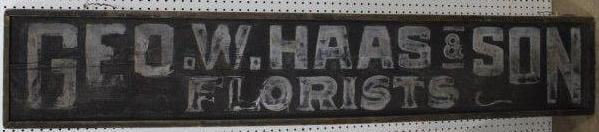 Geo. W. Haas and Son Florists wooden sign