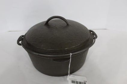 Unmarked hammered cast iron Dutch Oven