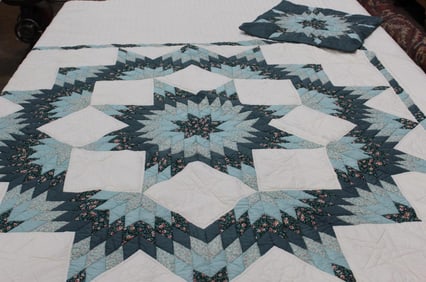 Off white and green Lone Star quilt