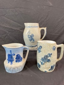 3- Stoneware pitchers