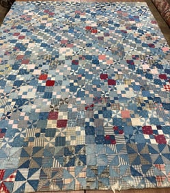 Early handstitched pinwheel quilt