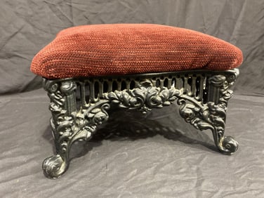 Ornate cast iron foot stool