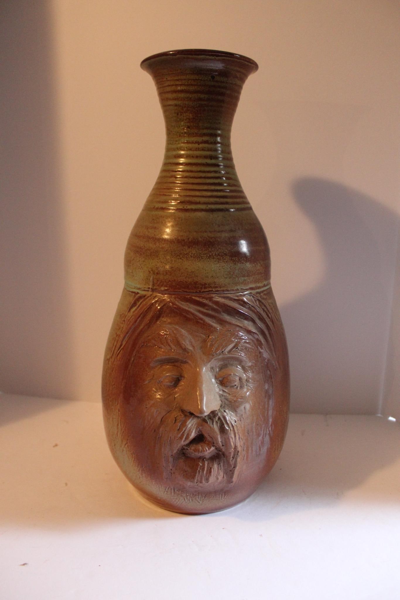 One of a Kind Dryden Hot Springs Ark. Face Vase: Dated 1977. One small chip from upper rim. 18 inches tall.