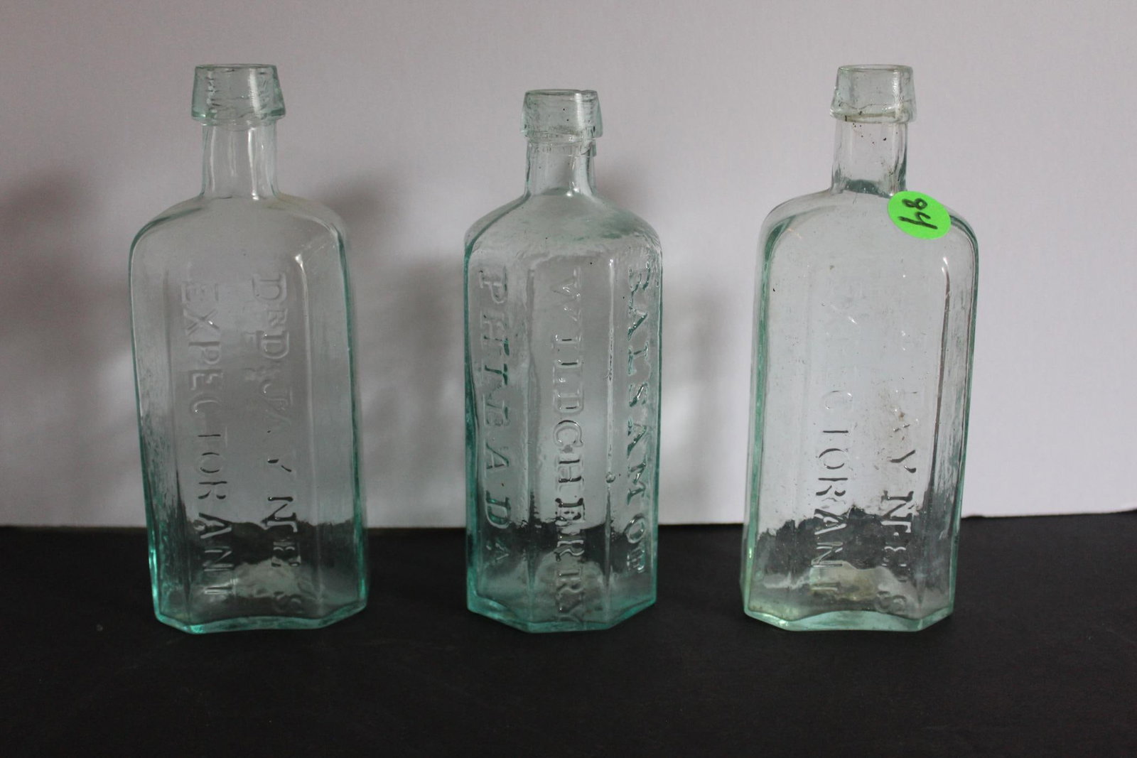 Dr. D. Jaynes Expectorant & Dr. Wistars Balsam Glass Bottles: 2- expectorant bottles are 6.75 inches tall. PhilaD. other bottle is Balsam of Wild Cherry. 6.5 inches tall also marked Philada. All are embossed and hand blown. No major chips or cracks