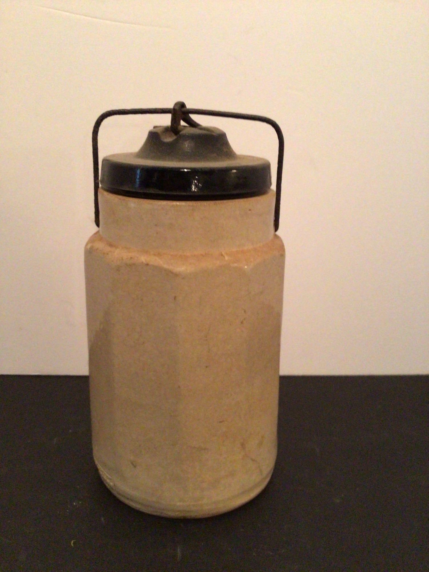 Lutz and Shramm Apple Crock: Stamped on lower rim. 8 inches tall.