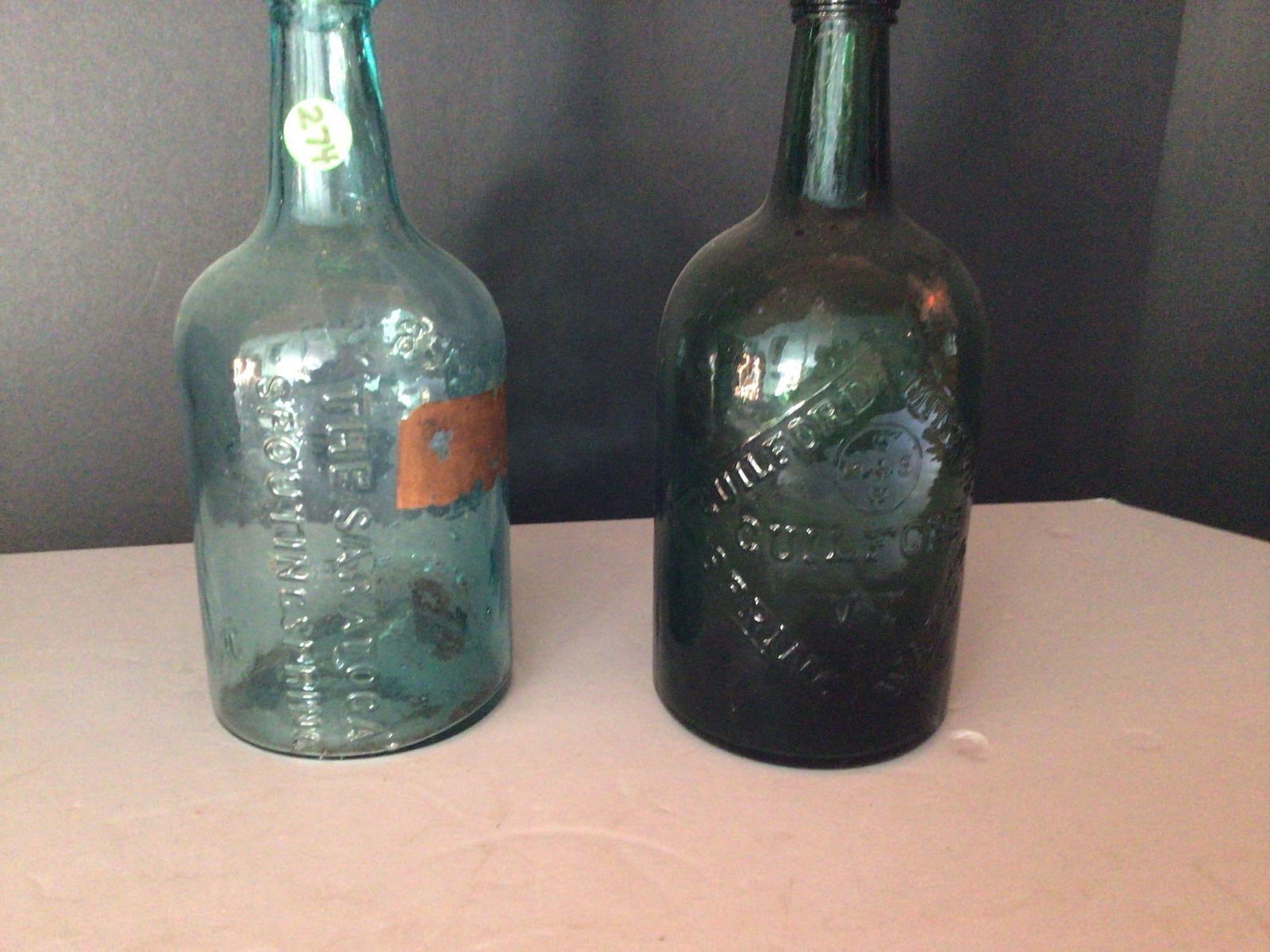 Geyser Spring & Guilford Mineral water bottles: Heavily embossed bottles in great condition and are 9.5in tall.