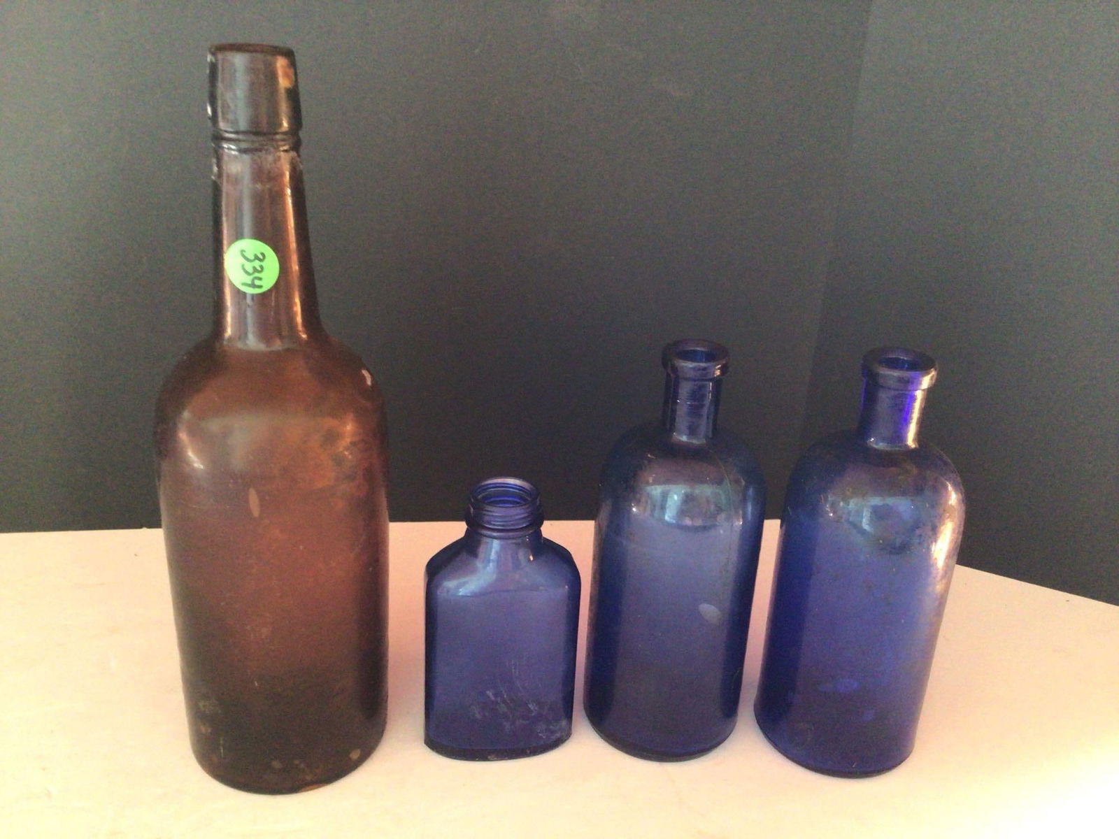 3-Cobalt medicine bottles & amber bottle (1 of 3)