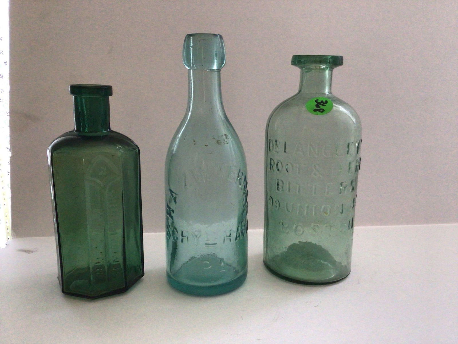 Dr. Langleys Root & Herb Bitters, Rumford Chemical Works, and HA. Zimmerman Bottles (1 of 4)