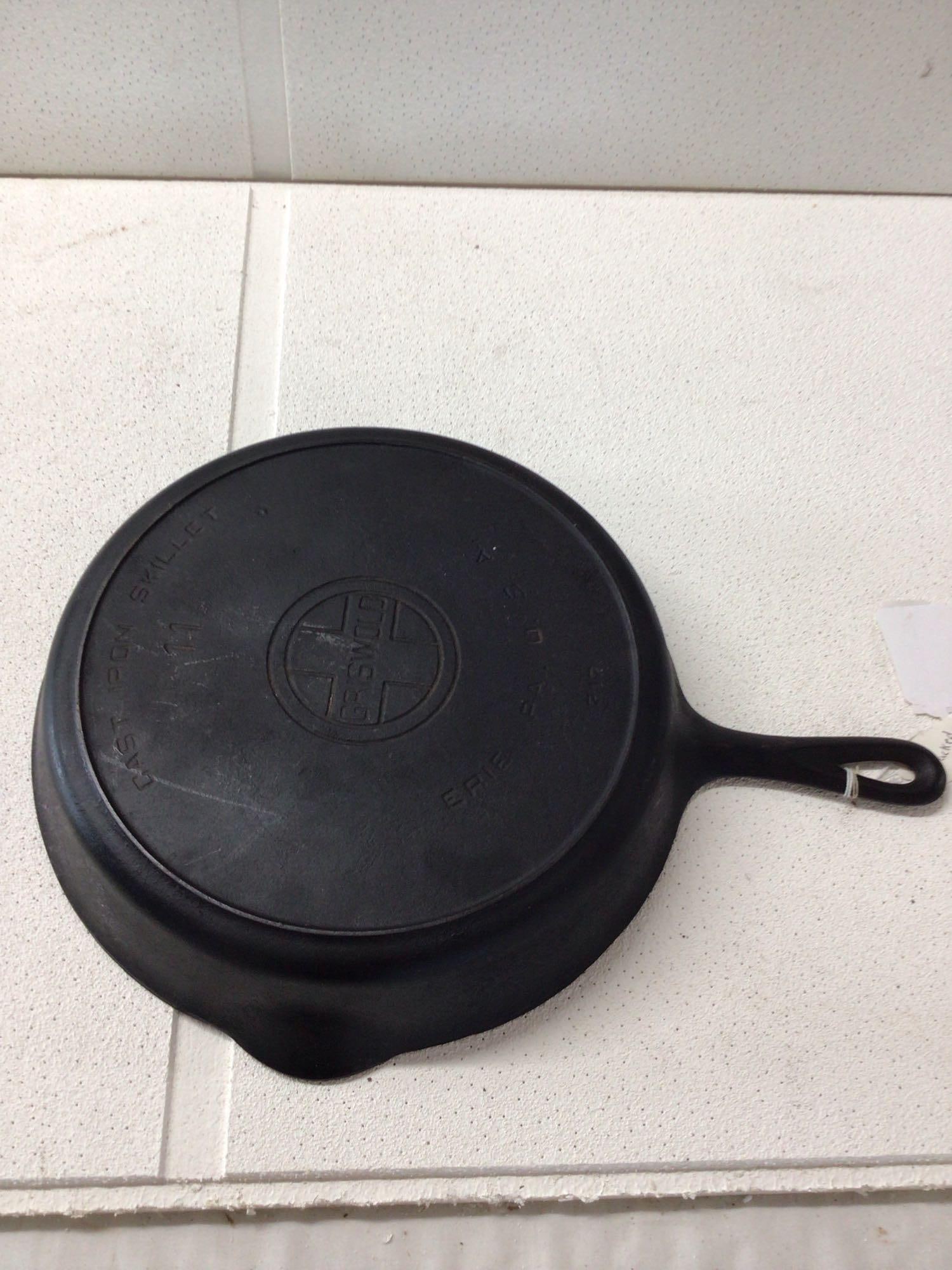Griswold #11 Skillet: This skillet does show a crack on upper rim, This is still very usable and in good condition otherwise