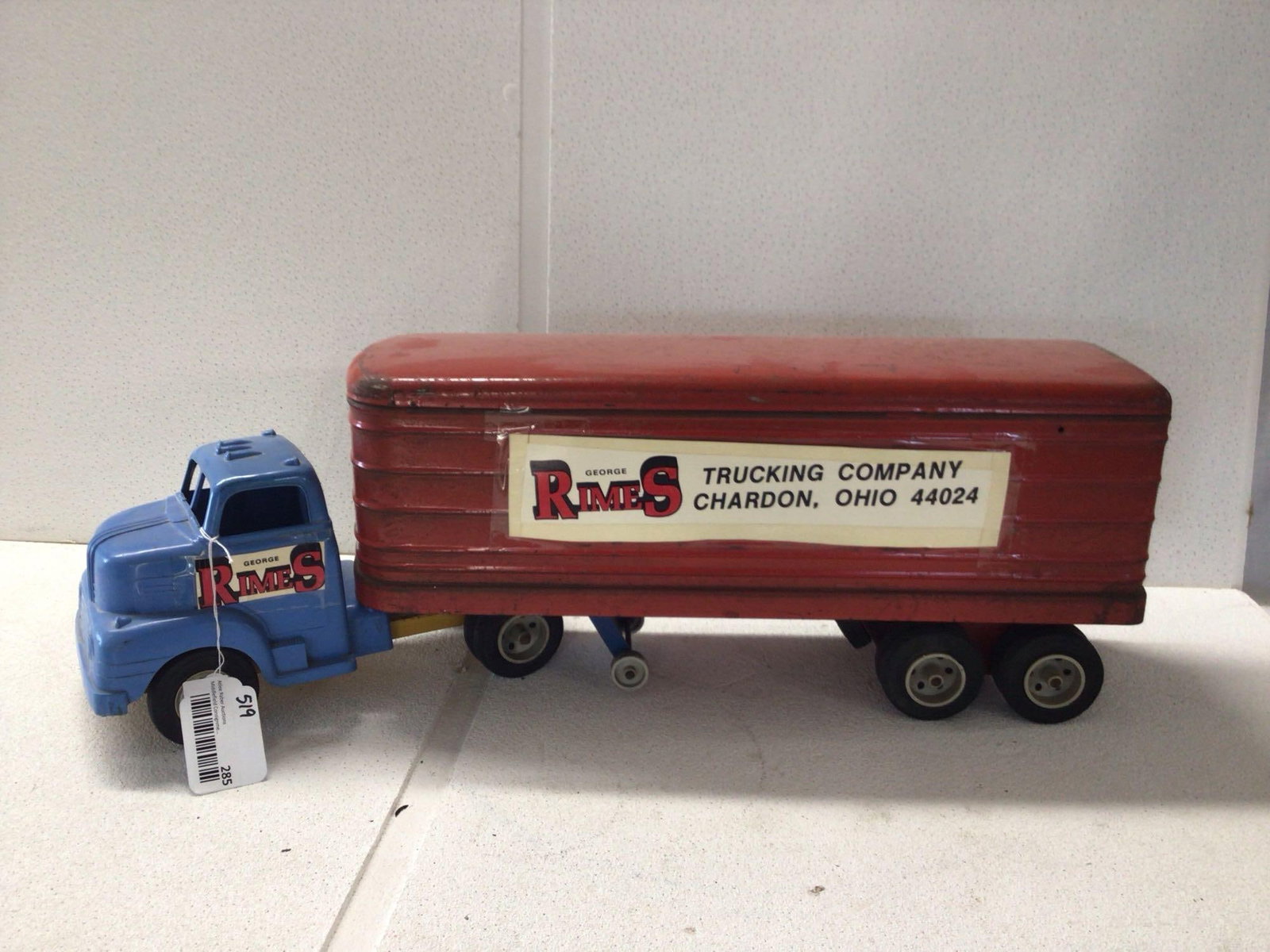 Marx Pressed Steel Trailer & Plastic Cab: George Rimes logo was added but can easily be removed. Truck is in good condition with a few minor scuffs and scratches from usage. Approx 26 inches long