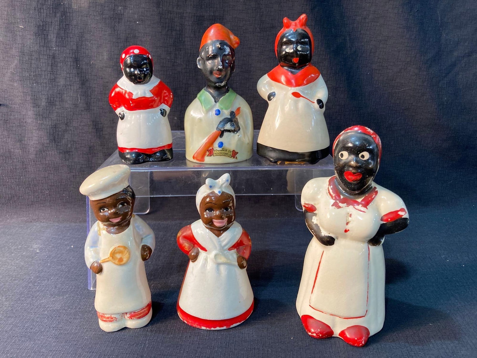 Black Americana Shakers, Bank, and Bell: all are in good condition, but may have minor paint loss due to age. Bank is 6.5 inches tall and dated 1941 on the bottom.