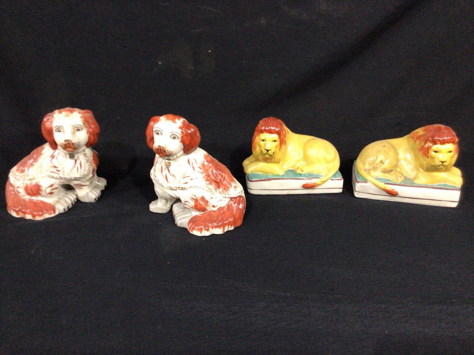 Staffordshire Style Dog and Lion Statues: Both in good condition. Dogs are 5x5x2 and lions are 5x3x4