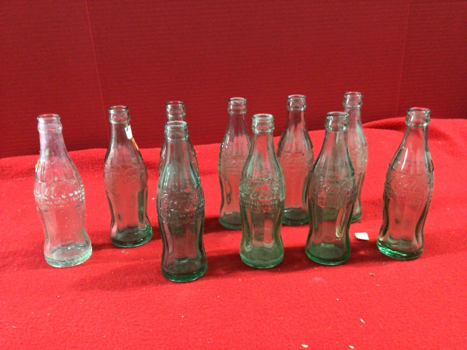 COCA COLA BOTTLES: TOLEDO, LIMA, DEFIANCE,NEWARK, AND PIQUA OHIO. ONE IS UNION CITY IND. LOT OF 10