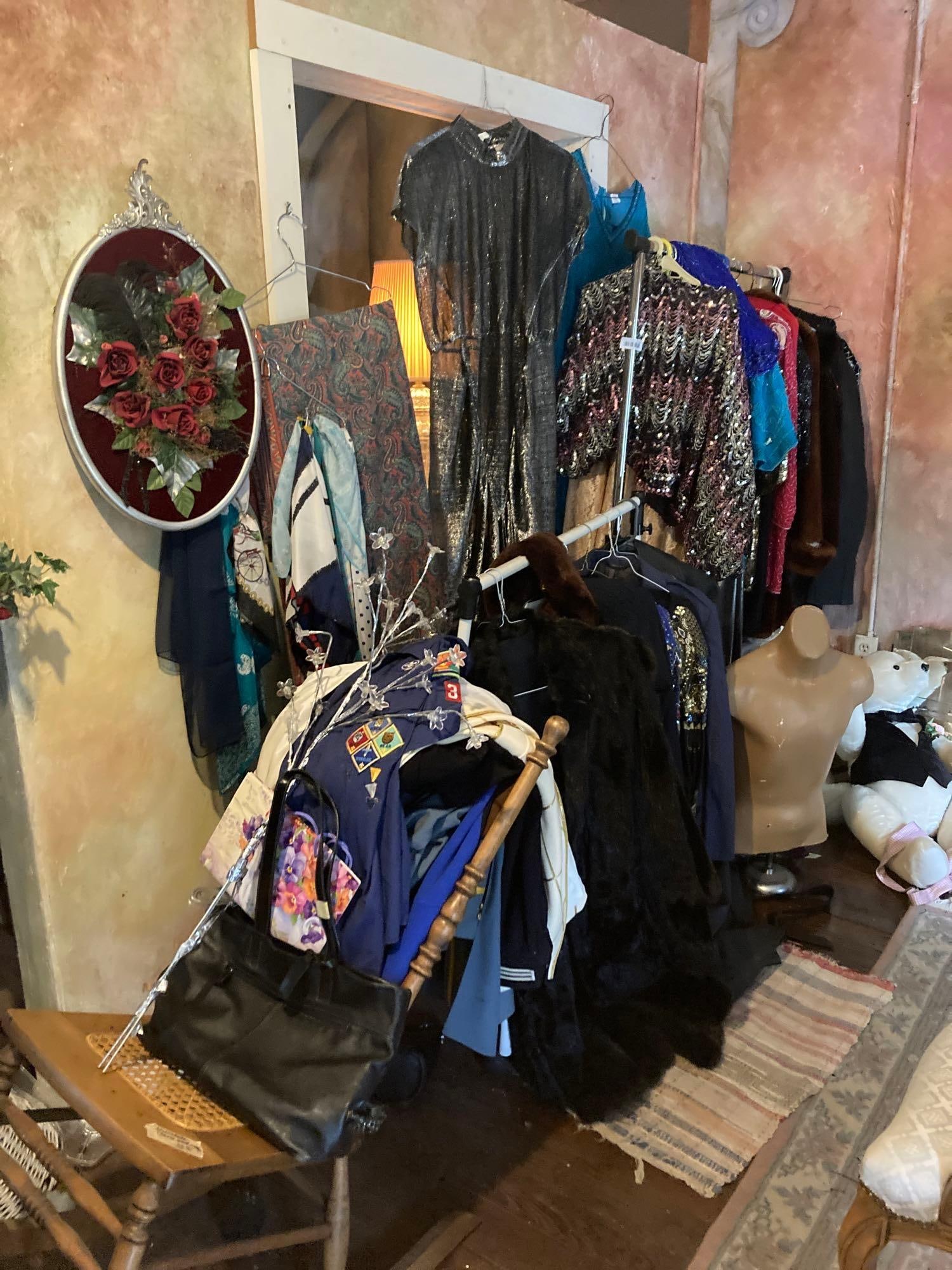 VINTAGE CLOTHING, MANNEQUIN AND CLOTHING RACK: VARIOUS SIZES AND LABELS. BEAUTIFUL DRESSES, FUR COATS, AND MORE