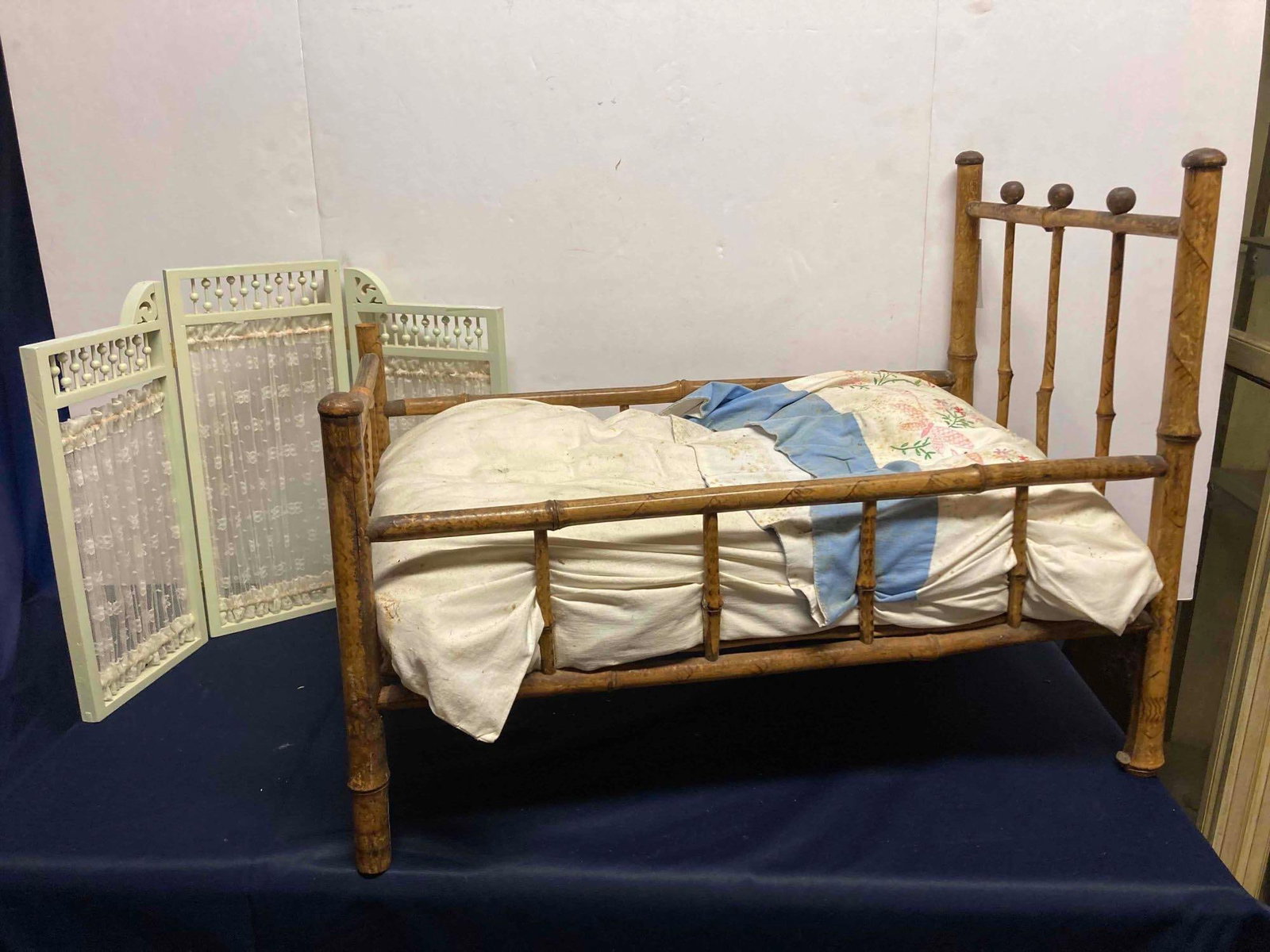 BAMBOO DOLL BED AND WOOD SCREEN: BED IS 24X13X18 SCREEN HAS LACE DESIGNS WHEN OPEN 20X14.5
