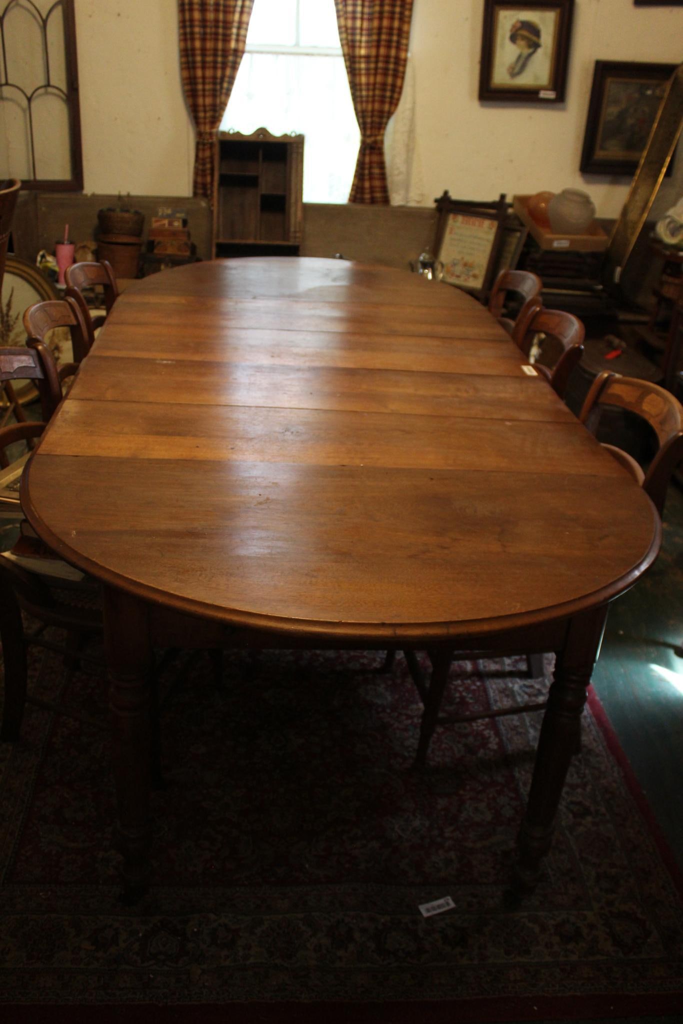 PRIMITIVE FARMHOUSE OVAL TABLE WITH 5 LEAVES AND 6 CANE BOTTOM CHAIRS (1 of 3)